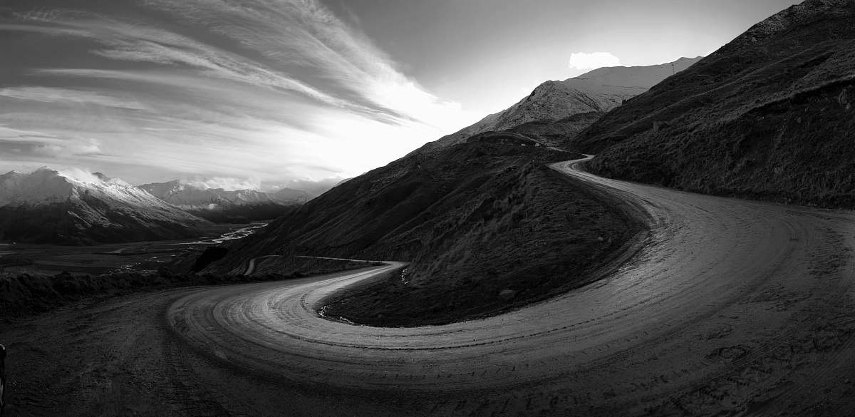 new zealand road surrounded by mountains mountain